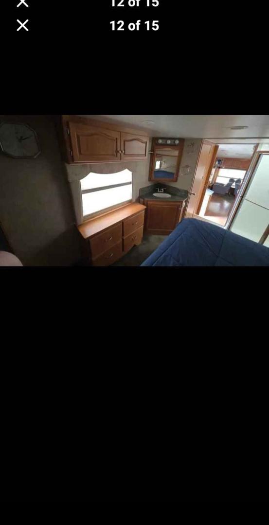2007 White Western Alpen Lite , located at 923 US HWY 87 E., Billings, MT, 59101, (406) 245-0456, 45.795788, -108.451881 - 2007 Western Rv Alpenlite PERFECT TRAILER FOR A COUPLE!!! 3 slides solid surface countertops, spacious kitchen area, glass enclosed, shower, cold weather package, solar package, slide out cart in underbelly. Front queen bed and couch makes into bed. Could sleep 4. WE CERTIFY OUR USED TRAILERS!!!J- Photo#11