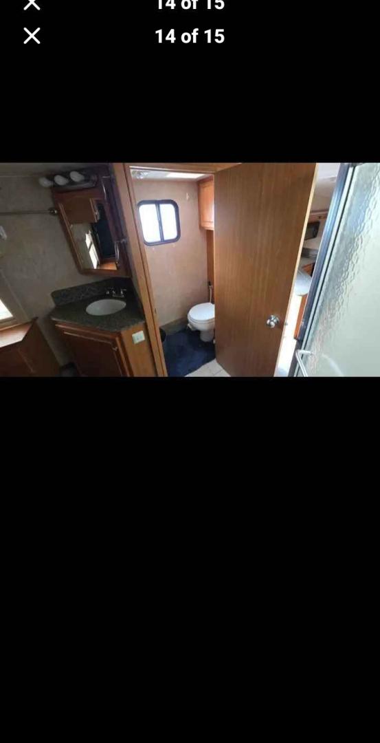 2007 White Western Alpen Lite , located at 923 US HWY 87 E., Billings, MT, 59101, (406) 245-0456, 45.795788, -108.451881 - 2007 Western Rv Alpenlite PERFECT TRAILER FOR A COUPLE!!! 3 slides solid surface countertops, spacious kitchen area, glass enclosed, shower, cold weather package, solar package, slide out cart in underbelly. Front queen bed and couch makes into bed. Could sleep 4. WE CERTIFY OUR USED TRAILERS!!!J- Photo#13