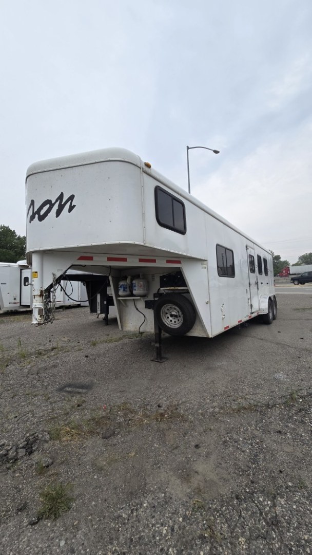 2012 White Bison Trail Express , located at 923 US HWY 87 E., Billings, MT, 59101, (406) 245-0456, 45.795788, -108.451881 - 2012 Bison Trail Epress 380 LQ Located in Billings MT $25,900 This is a really nice 2 owner, 3 horse, 7' wide, living quarter horse trailer. Aluminum on steel, auto awning and auto front jacks, full bath, shower, toilet, a/c, furnace, hot water, stud stall, fold down windows on front. Front que- Photo#0