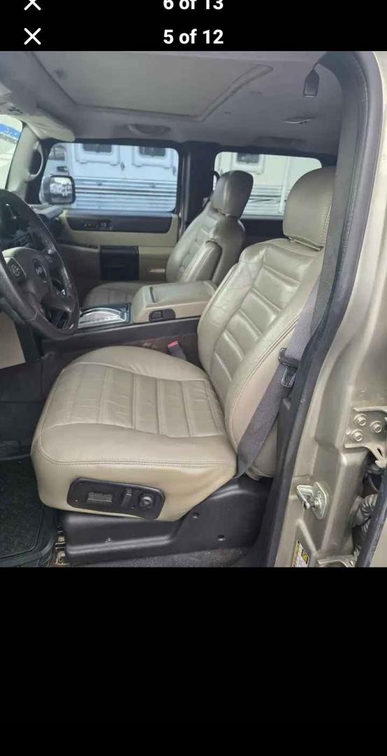 2005 Grey /Tan Hummer H2 , located at 923 US HWY 87 E., Billings, MT, 59101, (406) 245-0456, 45.795788, -108.451881 - 2005 Hummer H2 · Suv · Driven 102,444 miles Located in Billings MT $14,900 2005 Hummer H2 4x4 w 102444 miles. This is montana luxury. The heated leather seats will keep u warm on the cold days. Auto windows... doors ... locks cruise tilt make it easy to ride in style. The interior is immacu- Photo#4