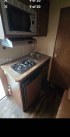 2012 White Bison Trail Express , located at 923 US HWY 87 E., Billings, MT, 59101, (406) 245-0456, 45.795788, -108.451881 - 2012 Bison Trail Epress 380 Located in Billings MT $25,900 This is a really nice 2 owner, 3 horse, 7' wide, living quarter horse trailer. Aluminum on steel, auto awning and auto front jacks, full bath, shower, toilet, a/c, furnace, hot water, stud stall, fold down windows on front. Front quee- Photo#8