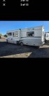 2004 White Fleetwood Tioga , located at 923 US HWY 87 E., Billings, MT, 59101, (406) 245-0456, 45.795788, -108.451881 - 2004 Fleetwood Tioga 31' w/slide $28 900 Located in Billings MT 2004 Tioga 31 w is one of the nicest motorhomes I've seen all year. It has 31386 miles on a ford Triton v10 chasis. It has a brand new auto awning to keep u out of the heat of the day. It has alcoa wheels w like new Yokohama tir- Photo#1